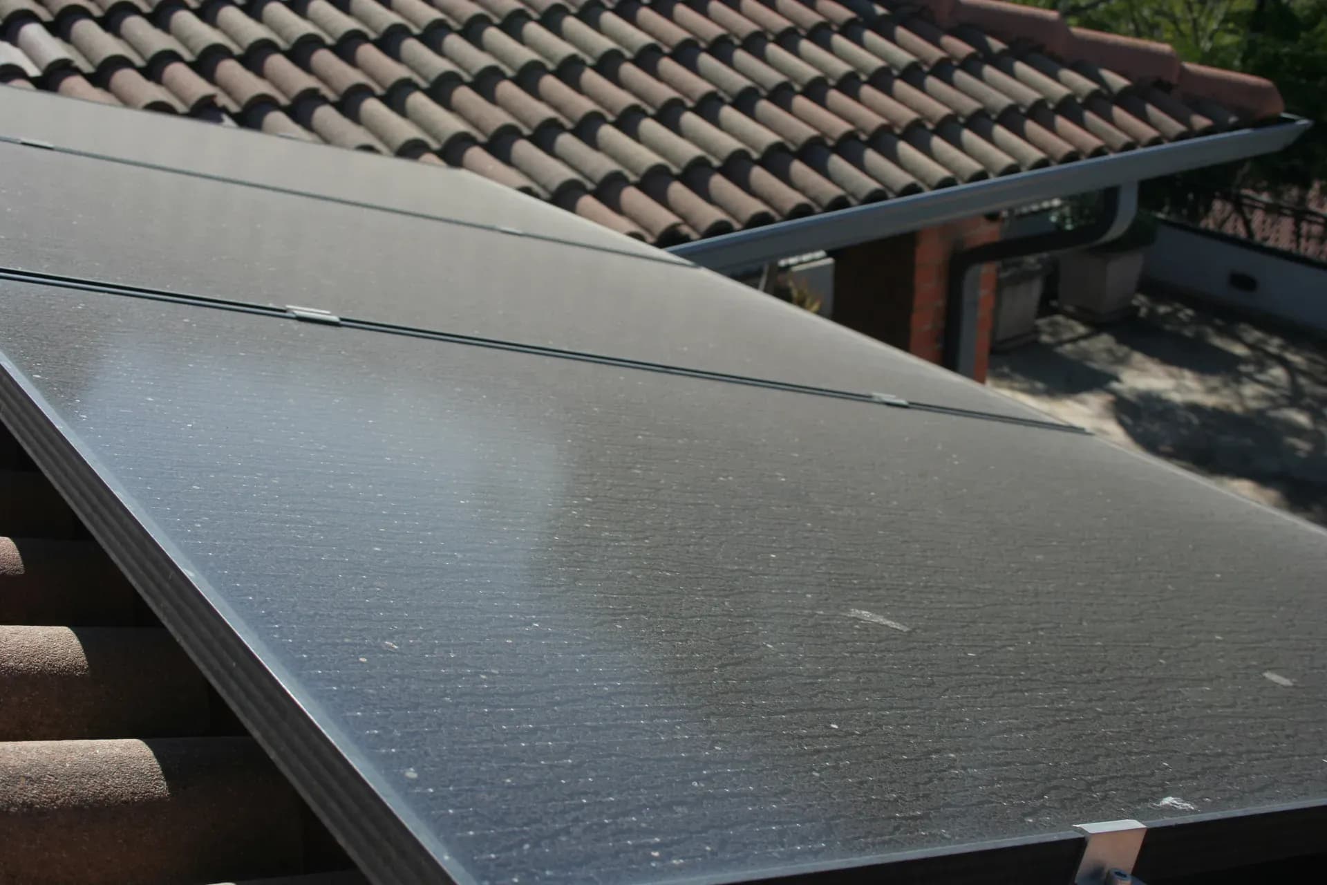 Dusty solar panels on a Pretoria rooftop before a professional HelioClean wash