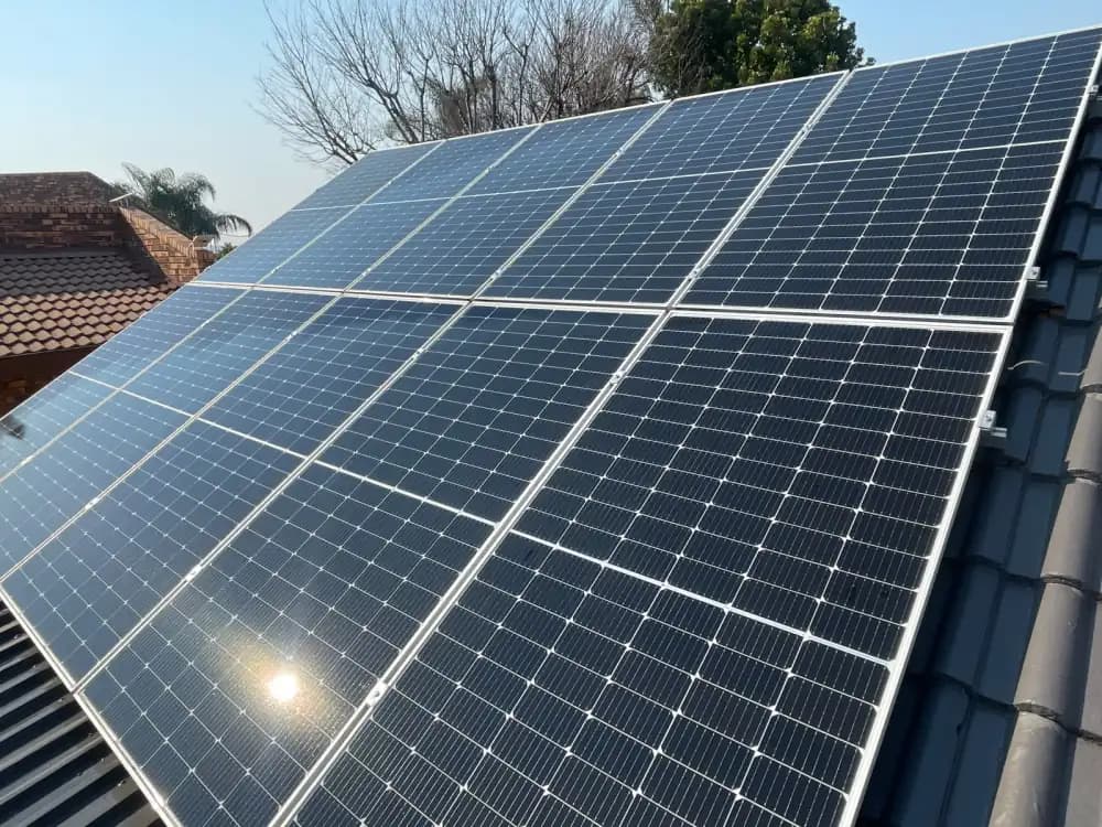 The same tiled-roof solar panels gleaming after pure-water cleaning
