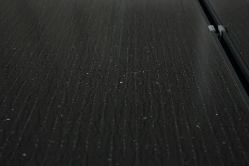 Dirty solar array with visible buildup before cleaning